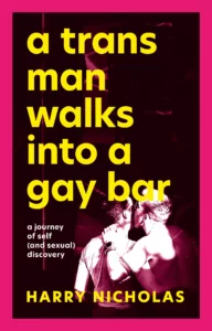 A trans man walks into a gay bar - cover image with two men in the lower corner hugging and kissing